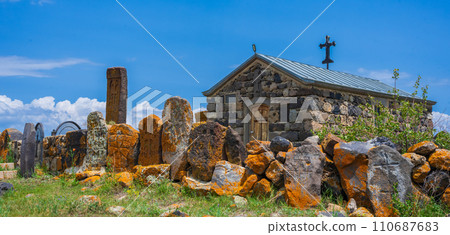 Artsvatrich Chapel on the shore of Lake Sevan, ancient khachkars with the image of a cross are Armenian shrines 110687683