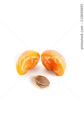 Half apricot isolated on white background.. 110689895