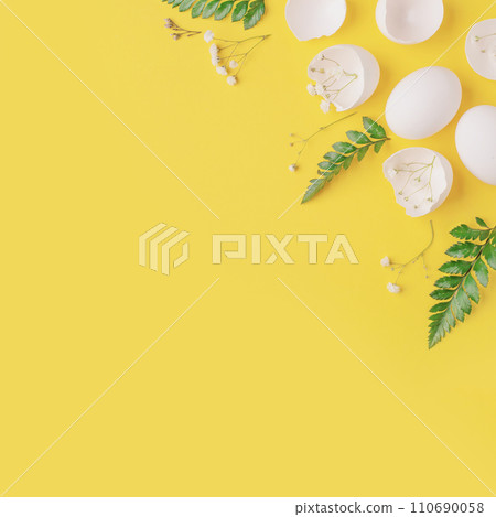 White Easter eggs and shells on a bright yellow background. White Easter eggs and shells on a bright yellow background. 110690058