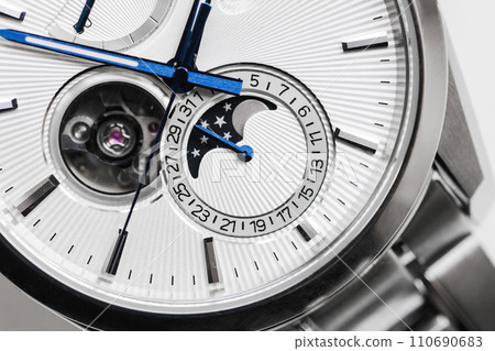 Macro photo of mechanical moon phase wristwatch Macro photo of mechanical moon phase wristwatch 110690683