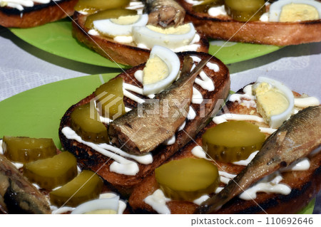 Snack. Bread with smoked fish. Snack. Bread with smoked fish. 110692646