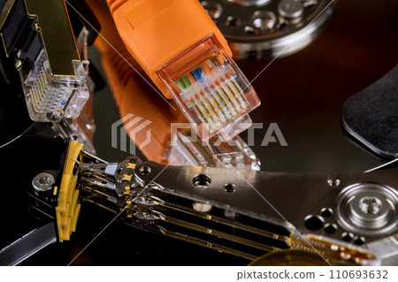 Computer technology digital backup by ethernet cables connected to internet backup files online database storage 110693632