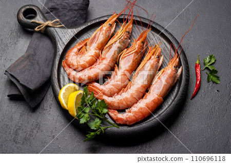 Fresh seafood. Board with langoustines 110696118