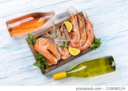 Seafood and Wine on a Table Seafood and Wine on a Table 110696124