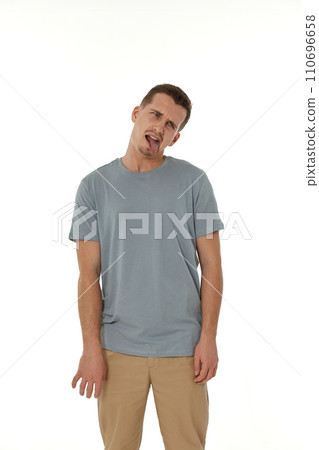 offended frustrated young man on white background. sadness offended frustrated young man on white background. sadness 110696658