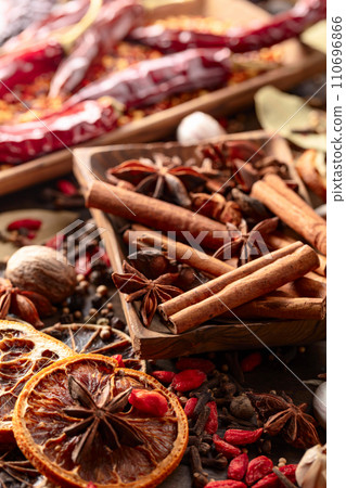 Various spices on a kitchen table. Various spices on a kitchen table. 110696866