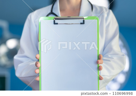 Doctor surgeon shows a checklist. Doctor surgeon shows a checklist. 110696998