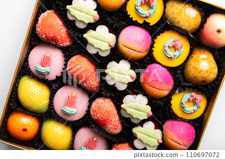 Marzipan sweets as fruits 110697072
