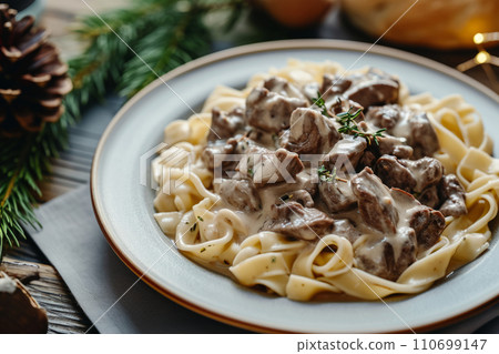 Creamy beef stroganoff with fresh greenery. Generative AI 110699147