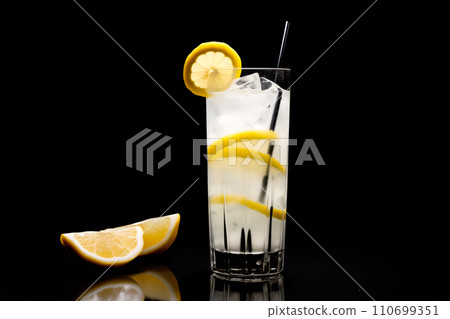 Refreshing classic Tom Collins or Whiskey sour cocktail with a maraschino cherry and lemon slice on black background Refreshing classic Tom Collins or Whiskey sour cocktail with a maraschino cherry and lemon slice on black background 110699351