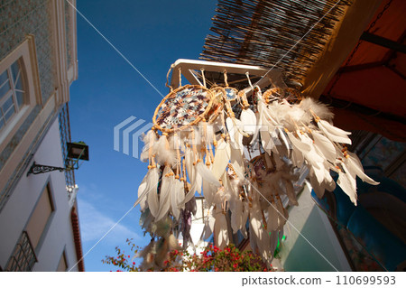 Dreamcatcher sunset boho chic ethnic amulet symbol concept. 110699593