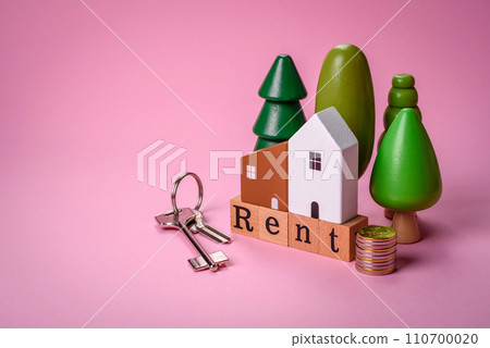 Small wooden house and the inscription for rent. Concept for sale, rental of real estate for a family Small wooden house and the inscription for rent. Concept for sale, rental of real estate for a family 110700020