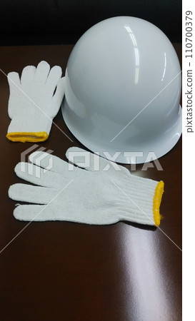 Disaster goods: helmet and work gloves Disaster goods: helmet and work gloves 110700379