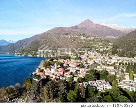 A view of a village around Mount Kinabalu valley in the early morning in Italy. A view of a village around Mount Kinabalu valley in the early morning in Italy. 110700580
