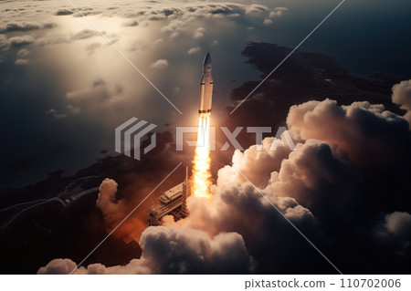Aerial view of rocket launch at sunrise over ocean coast 110702006