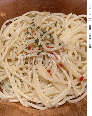 "Peperoncino" eaten at an Italian family restaurant 110702788