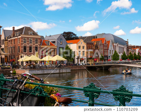 Summer landscape with a view of the city streets of Leiden 110703209