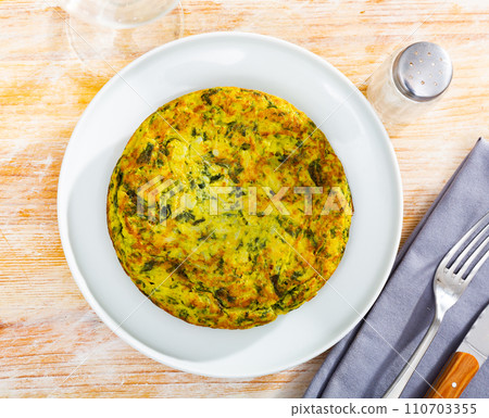 Spinach omelette served for breakfast on platter Spinach omelette served for breakfast on platter 110703355