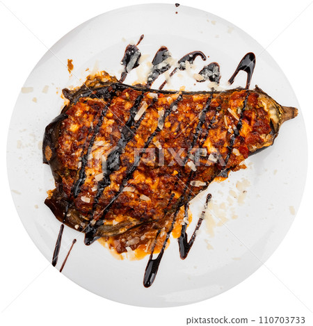 Eggplant stuffed with young cheese baked under egg crust. 110703733