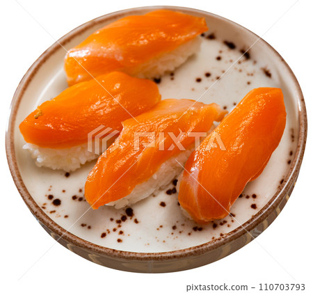 Sushi set of nigiri, served on rectangular plate 110703793