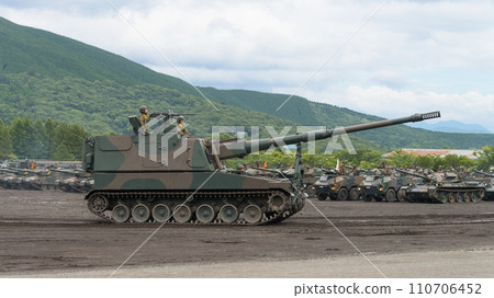Japan Ground Self-Defense Force Type 99 self-propelled 155mm howitzer in motion 110706452