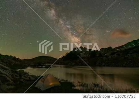 Stars, Milky Way Galaxy over Camp Tent 110707755