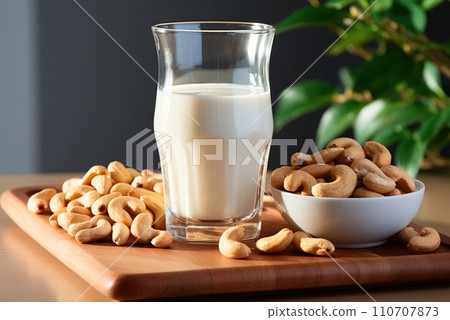 Alternative milk from cashews in a glass on the table 110707873