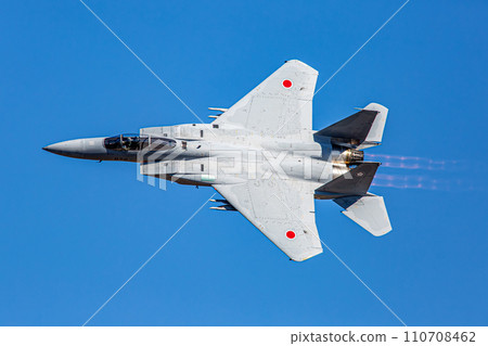 F-15 fighter jet flying in the blue sky 110708462