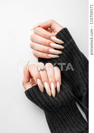 Manicured nails with pearlescent nail polish 110708571