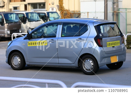 Image of a car being patrolled to check for abandoned vehicles Image of a car being patrolled to check for abandoned vehicles 110708991