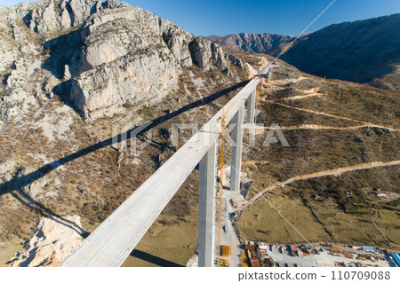 Construction of bridge of a new highway through the Moraca canyon in Montenegro Construction of bridge of a new highway through the Moraca canyon in Montenegro 110709088