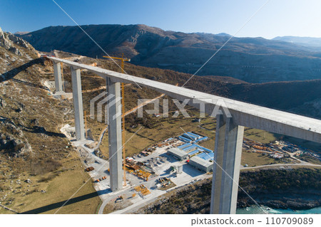 Construction of bridge of a new highway through the Moraca canyon in Montenegro Construction of bridge of a new highway through the Moraca canyon in Montenegro 110709089