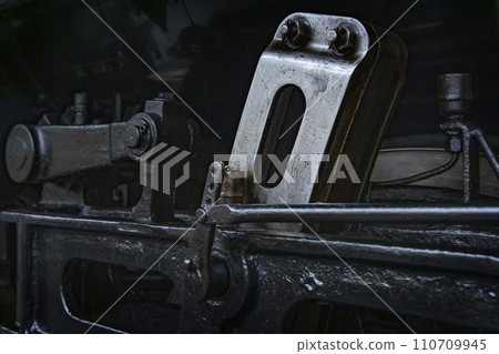 A durable steam engine made of black metal parts 110709945