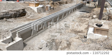 Concrete U-shaped ditch at construction site Side ditch 110712202