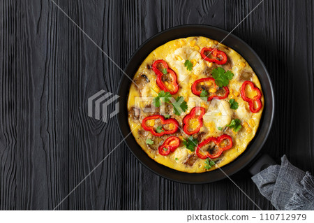 omelette with vegetables in a pan, top view omelette with vegetables in a pan, top view 110712979