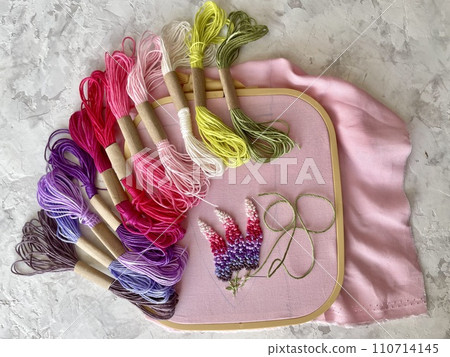 embroidery of flowers in French knot technic, canvas, threads mouline and needle 110714145