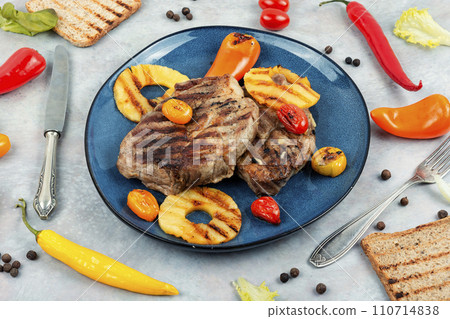 Grilled meat steak with pineapple. Grilled meat steak with pineapple. 110714838