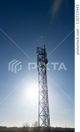 Solar Flare: Telecommunication Tower Against the Sun 110715945