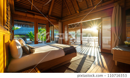 Bedroom of amazing overwater bungalow in tropical paradise 110716353