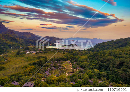 Aerial view of luxury villas on Mahe Island, Seychelles at sunset 110716991