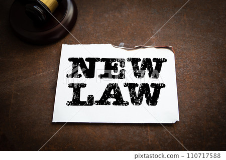 New Law Concept. Text on a piece of paper, rusty metal background 110717588