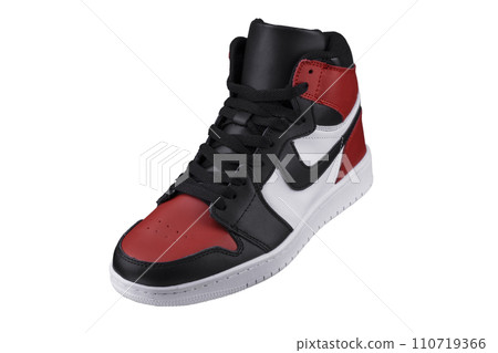 Side view of a high sneaker with red and black accents. 110719366