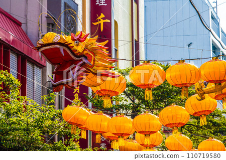 Yokohama cityscape in Japan 2024 Yokohama Chinatown with Chinese New Year lights. Dragon lanterns on the Ximen Street side of Chinatown = January 19, 2020 Yokohama cityscape in Japan 2024 Yokohama Chinatown with Chinese New Year lights. Dragon lanterns on the Ximen Street side of Chinatown = January 19, 2020 110719580