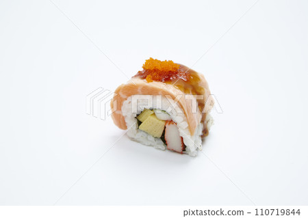 Roll made of salmon maki on white background. 110719844