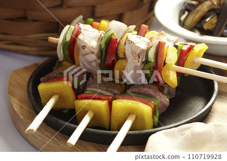 BBQ barbecue ingredients. Marinated BBQ meat. Marinated grill chicken and kebab. Vegetables and meat for barbecue 110719928