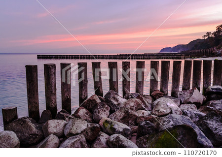 Wooden groynes on the beach of Baltic sea in Svetlogorsk at sunrise. Kaliningrad region. Russia 110720170