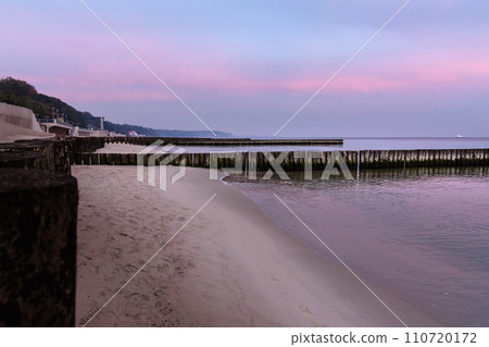 View on beach of Baltic sea in Svetlogorsk at sunrise. Kaliningrad region. Russia View on beach of Baltic sea in Svetlogorsk at sunrise. Kaliningrad region. Russia 110720172