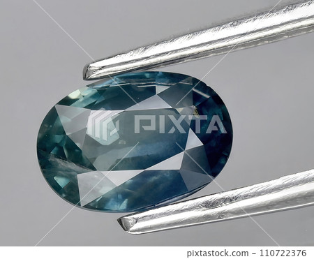 natural blue sapphire gem on the background natural blue sapphire gem on the background 110722376