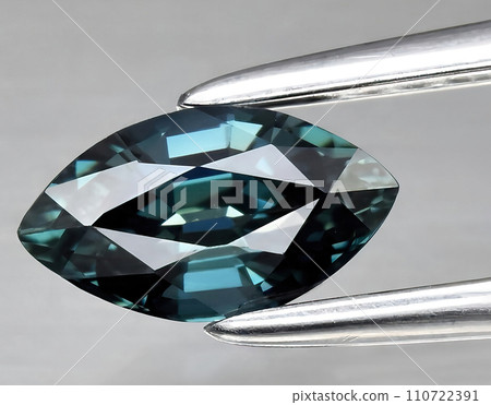 natural blue sapphire gem on the background 110722391