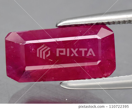 natural pink ruby gem on the background natural pink ruby gem on the background 110722395